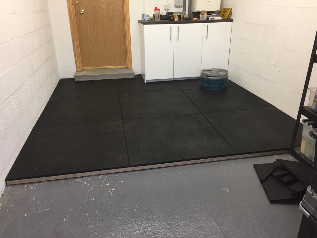 36mm of plywood with 18mm rubber tiles on top - my lifting platform!