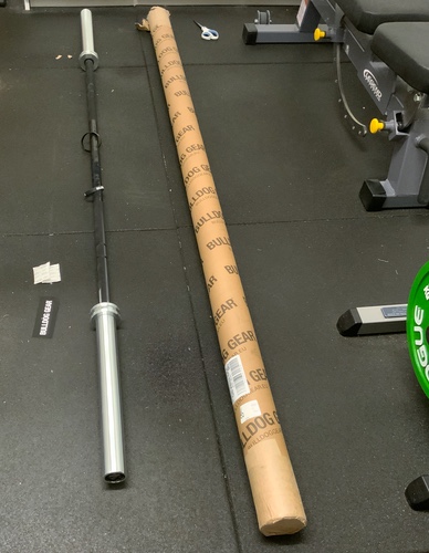 Unboxing: The barbell is shipped in a heavy duty tube