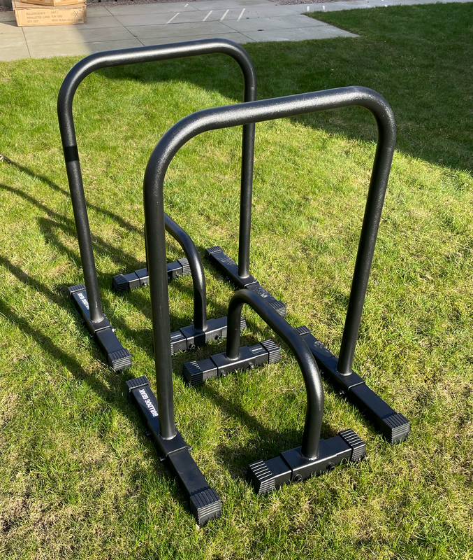 Another picture showing the size difference between big & small parallettes