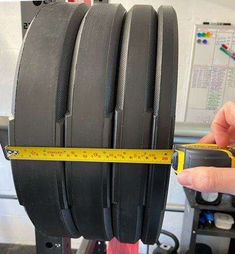 Around 21cm width here for a 20kg / 15kg / 10kg / 5kg bumper plate combo