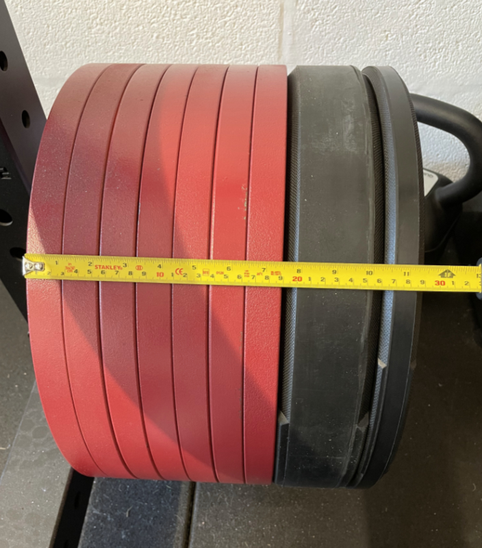 Bumper plates vs calibrated - example of how much thicker bumpers are